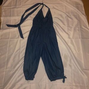 SLEEVELESS, BACKLESS JUMPER, WITH POCKETS, NEVER WORN, TAG STILL ATTACHED